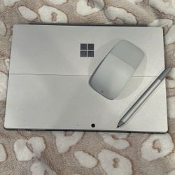Windows 7  with mouse and pen ( can be sold separately) 