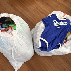 2 Full Trash Bags Of 3-6 Month Old Clothes 
