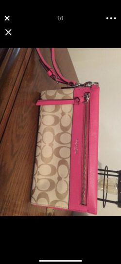 Pink coach wristlet