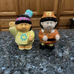 Ceramic Vintage Russ pair of salt and pepper shakers. Size approximately 3 1/2 inches tall. Brand new with tags on the bottom. Has been on display