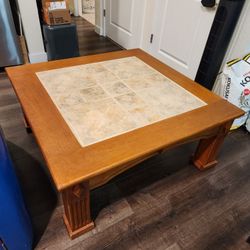 coffee table
tile inlay, wood base
42x42x18H"
sturdy
$50