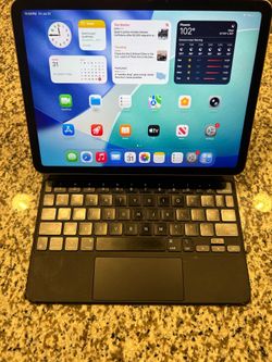 Apple iPad Air 5th generation 64gb  MM9D3LL/A Works great Some dings please see pictures Comes with apple keyboard/case.