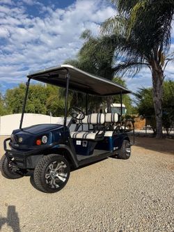 2014 Cushman ezgo txt 6-seater, roypow 48v lithium, limo style, about 20 mph