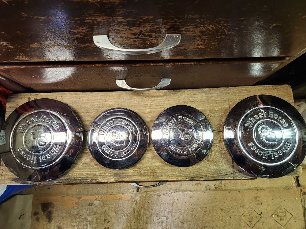 Wheelhorse Tractor Hubcaps: 2 Front 6", 2 Rear 8" - excellent condition $300 obo