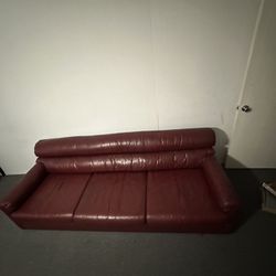 Authentic red Leather couch. 