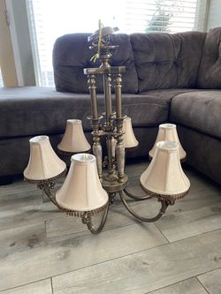6 large size chandelier candle 🕯 style with 6 shades paid $800 asking $400 in excellent condition. Beautiful elegant made with marble and bronze