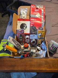 Handyman box filled with various tools and hardware
