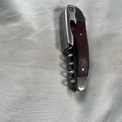 Knife And Cork And Bottle Opener