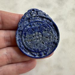 Carved genuine, lapis lazuli stone pendant