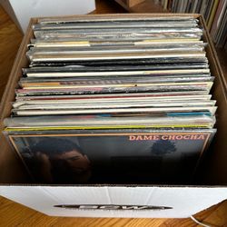 Vinyl records - cheap singles / albums