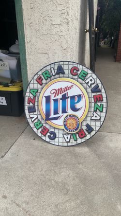 Vintage round tin Miller lite sign