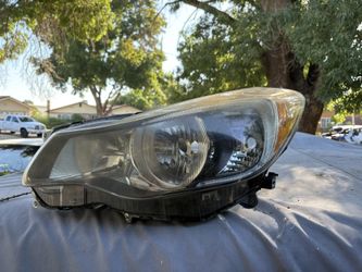 2012 Subaru Impreza left head light assembly