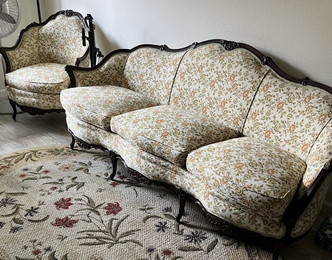 Vintage cream ,orange,and green floral print couch and matching chair