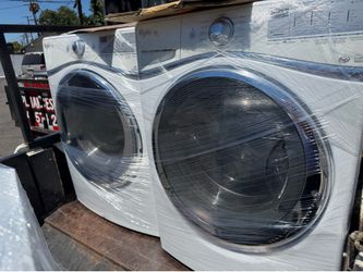 Whirpool  white front load washer and gas dryer