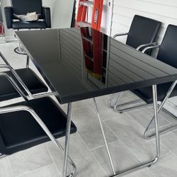 black table with 4 Chairs 