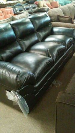 Brand new couch and loveseat black with warranty