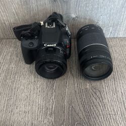 Canon EOS Rebel SL1 DSLR Camera With 50mm and 75-300mm Lens