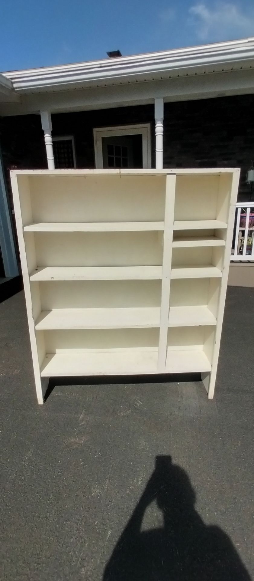 Shallow Large Wooden Cabinet / Bookshelf Storage (45" W x 55" H Great, sturdy wooden cabinet/shelving unit painted white. Features an asymmetrical des
