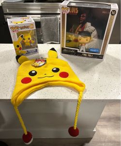 Pokemon funko pop and headwear