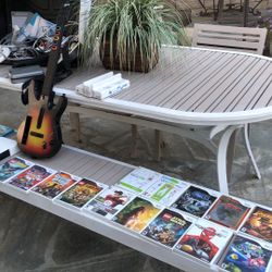 Nintendo Wii System with Two Guitars Plus 18 games in original Packages