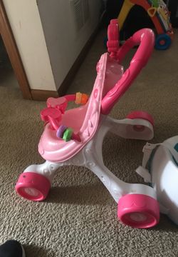 Booster seat and fish n price baby doll stroller
