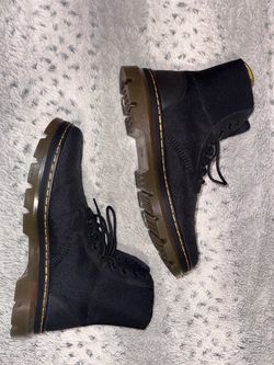Brand-new, never-worn Dr. Martens Combs boots in black.