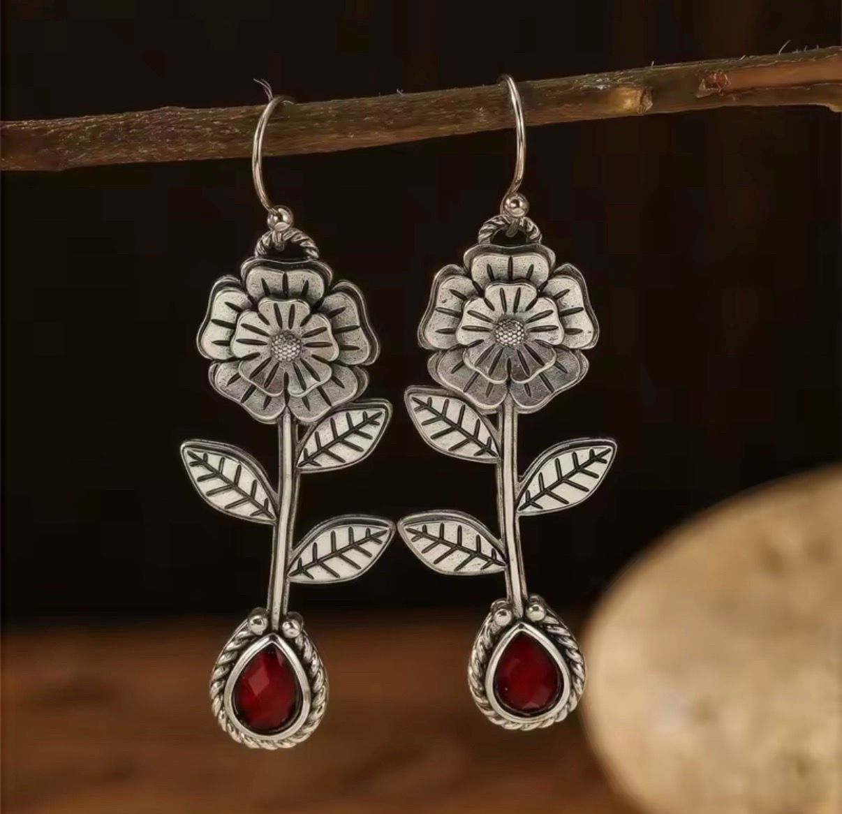 Beautiful flower design earrings with red stone