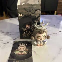Skull panda pop mart The Root