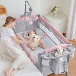 ADOVEL Baby Bassinet Bedside Crib, Pack and Play with Mattress, Diaper Changer and Playards from Newborn to Toddles,Pink