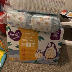 Diapers Size 1and2 Bottles And Bath Towel