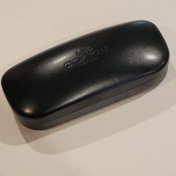 Coach New York Black Hard Clamshell Sunglasses Eyeglasses case. 
Pre-owned, very good shape. Please see photos for details. Would fit 
medium size gla