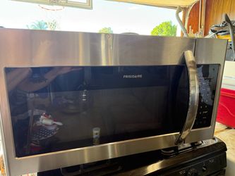 Frigidaire Stainless Steel Microwave — Less Than a Year Old!