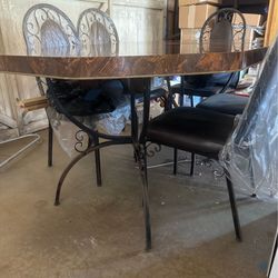Antique dining room table and chairs