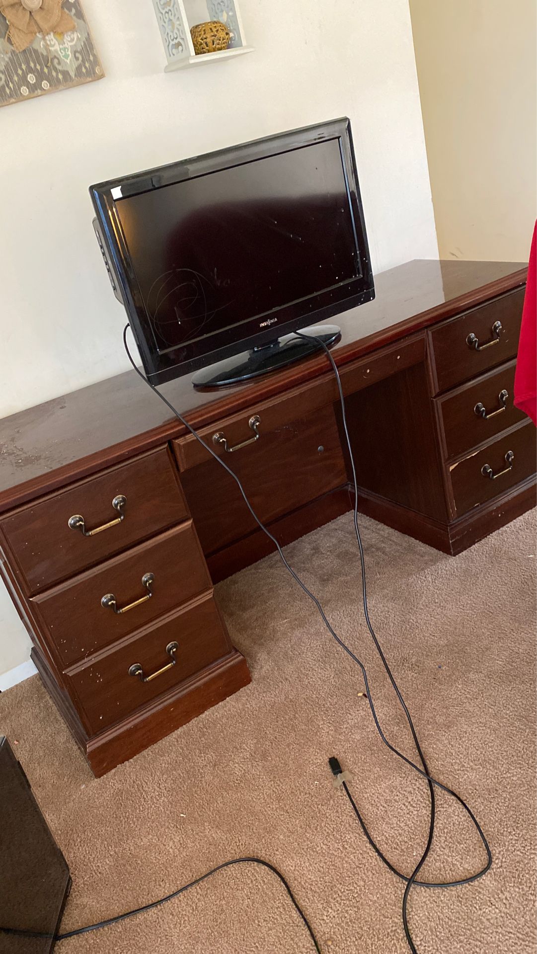 Tv with attached DVD player and desk