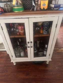 Distressed White Wood Bar Cabinet with Glass Doors