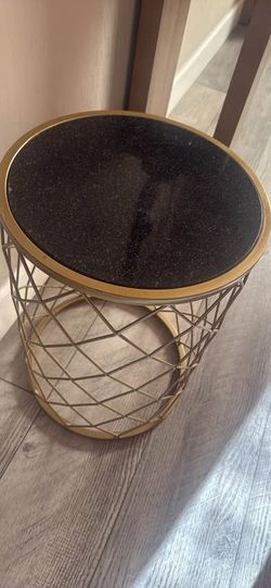 Accent granite and brass table