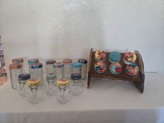 Pionner Woman Spice rack with jars.