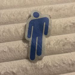 A piece of original Billie Eilish blohsh concert confetti with her fragrance sprayed on it