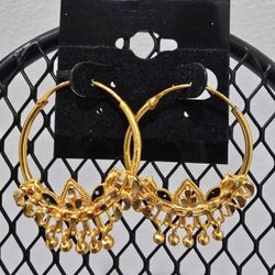 Golden Earrings With Small Red Stones Eyes