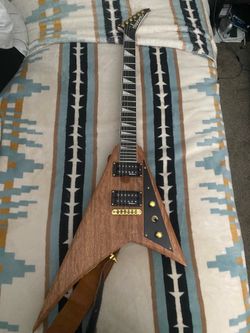 Jackson Randy Rhoads Flying V natural mahogany