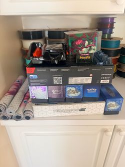 Pokémon cards and play mats and play game accessories
