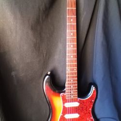 Squier By Fender Electric Guitar 
