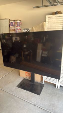 Large Flat Screen TV with Stand