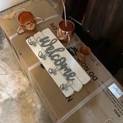 Welcome Sign And Copper Cups 