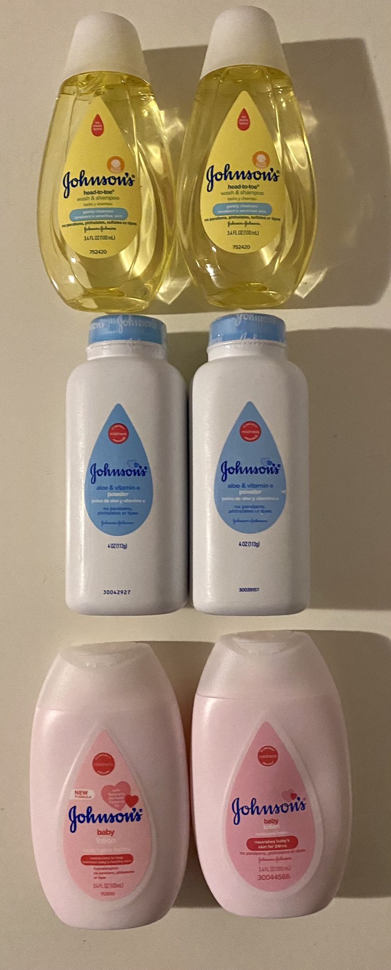 Johnson & Johnson travel size shampoo, powder or lotion 2 for $1