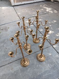 4 candeleros para fiestas $65