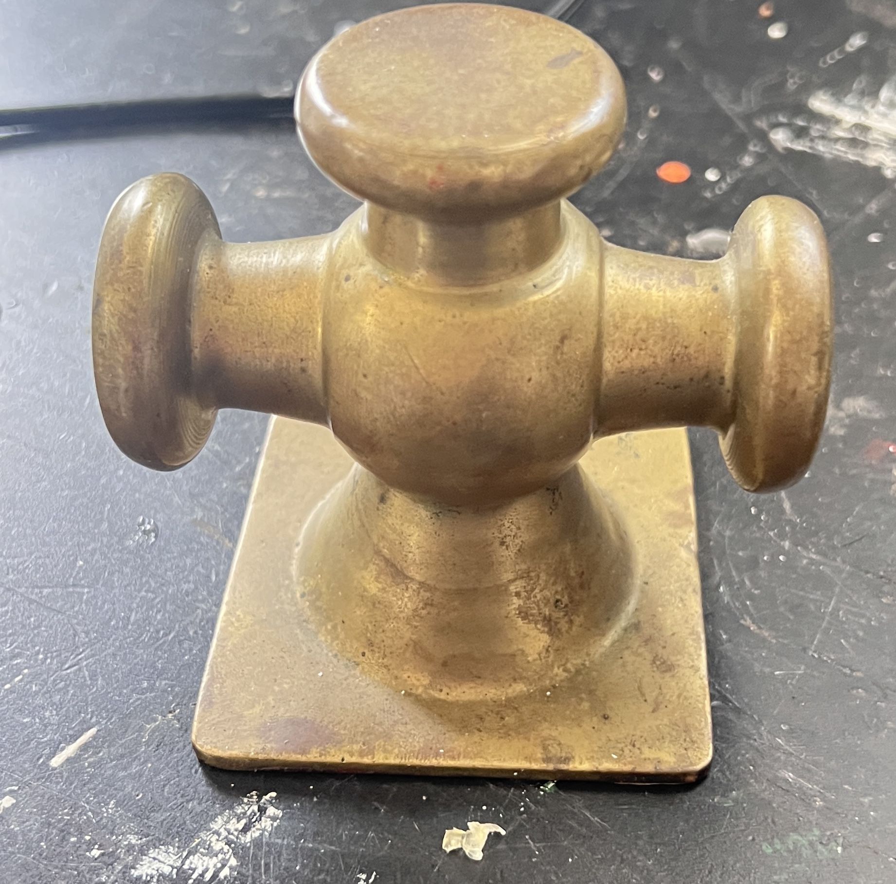 Vintage style brass mooring bitt paperweight.
