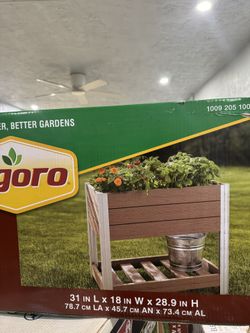 31 in. x 18 in. x 29 in. Vinyl Elevated Garden with Storage Shelf