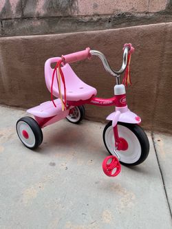 Girls pink tricycle