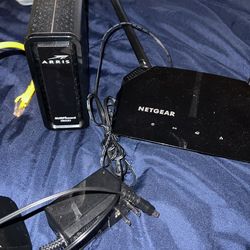 Netgear Router And Arris Modem With Cords
